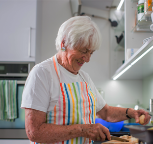 Woman cooking in her kitchen